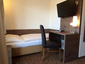 Letto o letti in una camera di Gasthof Süss