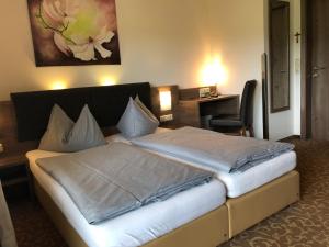 Letto o letti in una camera di Gasthof Süss