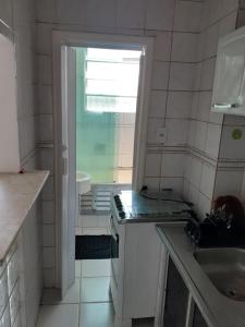 A cozinha ou cozinha compacta de Apartamento Loft Urca