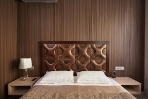 Uma cama ou camas num quarto em Hotel Vladpoint
