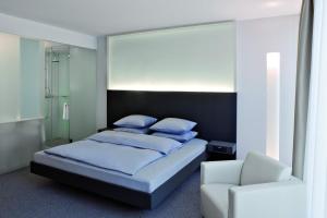 Voodi või voodid majutusasutuse INNSiDE by Meliá Düsseldorf Derendorf toas