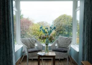 
A seating area at Burkedale House & Cottage
