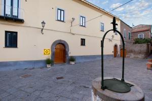 a building with a street light in a courtyard at Unconventional Sorrento Coast in Sant'Agnello