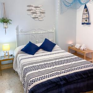 Posteľ alebo postele v izbe v ubytovaní Homely Málaga Goleta