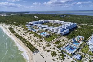 an aerial view of a resort on the beach at Riu Palace Costa Mujeres - All Inclusive in Cancún