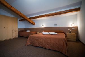 Letto o letti in una camera di Hotel Rio