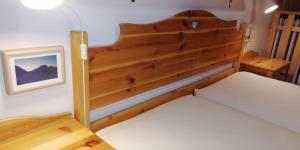 Postel nebo postele na pokoji v ubytování CasaMau Trilo