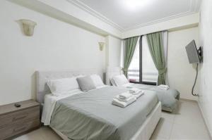 A bed or beds in a room at Visconti apartment.