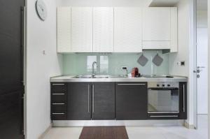 A kitchen or kitchenette at Visconti apartment.