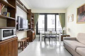 A television and/or entertainment centre at Visconti apartment.