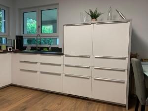Kuchyň nebo kuchyňský kout v ubytování Firmen & Ferienwohnung Brecht 1 + 12 fotografií