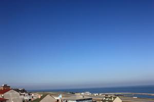 a view of a town with the ocean in the background at Anemon Kent Trabzon Otel in Trabzon +38 photos