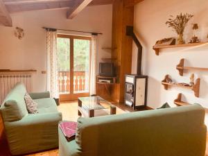 Ruang duduk di Casa della Montagna - Baita delle Rondini +21 gambar