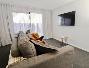 A seating area at Lake House - Te Anau Holiday Home