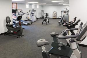a gym with treadmills and cardio equipment in it at Bridges Bay Resort in Arnolds Park