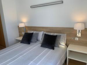 Postel nebo postele na pokoji v ubytování Santa María de Panticosa