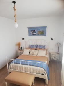 Ένα ή περισσότερα κρεβάτια σε δωμάτιο στο Hostal el lugar de la Mancha