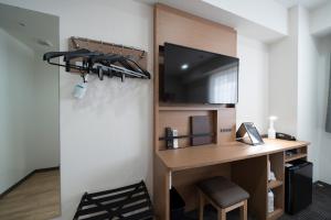 Een TV en/of entertainmentcenter bij Washington R&B Hotel Nagoya Ekimae
