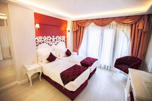 Postel nebo postele na pokoji v ubytování Dream Bosphorus Hotel