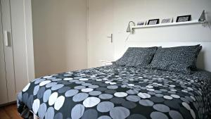 Postel nebo postele na pokoji v ubytování Little Suite - Léon