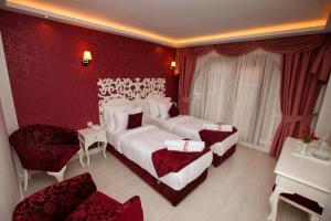 Postel nebo postele na pokoji v ubytování Dream Bosphorus Hotel