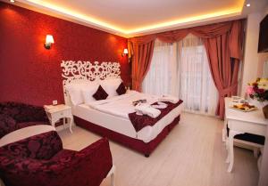 Postel nebo postele na pokoji v ubytování Dream Bosphorus Hotel