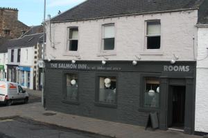 a building on the corner of a street at The Salmon Inn in Galashiels