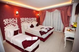 Postel nebo postele na pokoji v ubytování Dream Bosphorus Hotel