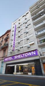 a building with a hotel shibuatown sign on it at Hotel Sheltown in Buenos Aires