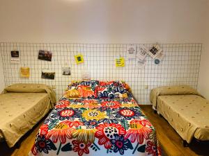En eller flere senge i et værelse på CASA RURAL VALLE SECRETO
