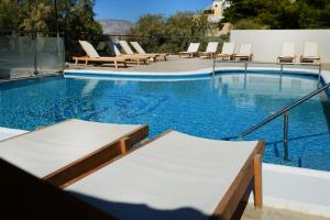 Galería fotográfica de MASSOURI BEACH HOTEL en Masouri 53 fotos más