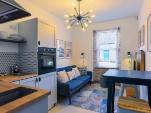 Kuchyň nebo kuchyňský kout v ubytování Macs Townhouse Dungarvan