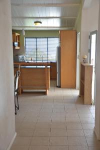 Kuchyň nebo kuchyňský kout v ubytování Tamarin Chambres d'Hotes