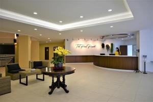 a lobby of a hotel with a waiting room at The Pines at Fraser's Hill, Malaysia in Bukit Fraser