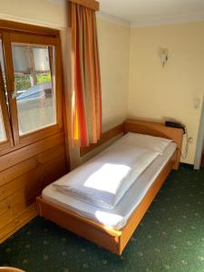 Postel nebo postele na pokoji v ubytování Hotel LukasMayr