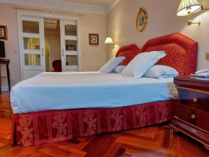 Cama ou camas em um quarto em Hotel Alameda Palace