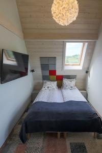 Posteľ alebo postele v izbe v ubytovaní Villa Moje Tatry 2