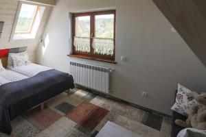Posteľ alebo postele v izbe v ubytovaní Villa Moje Tatry 2