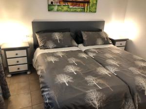 Łóżko lub łóżka w pokoju w obiekcie Casa Maiakai