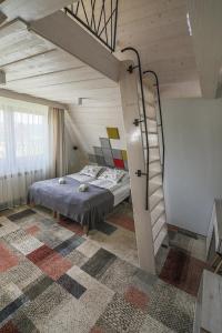Posteľ alebo postele v izbe v ubytovaní Villa Moje Tatry 2