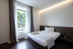 Postel nebo postele na pokoji v ubytování Domotel Kastri