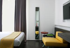 TV a/nebo společenská místnost v ubytování Domotel Kastri