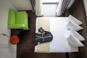 Postel nebo postele na pokoji v ubytování Domotel Kastri