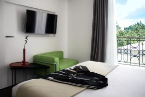 Postel nebo postele na pokoji v ubytování Domotel Kastri