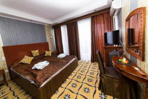 TV a/nebo společenská místnost v ubytování Duna Relax Hotel Ráckeve