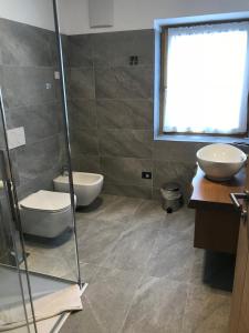 Koupelna v ubytování Hotel Piedibosco