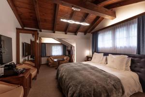 Televiisor ja/või meelelahutuskeskus majutusasutuses Boutique Hotel Albana Real - Restaurants & Spa