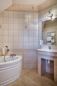 Koupelna v ubytování Hotel - Dworek Tryumf