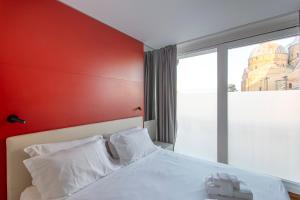 Letto o letti in una camera di Padova Suites C20