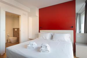 Letto o letti in una camera di Padova Suites C20